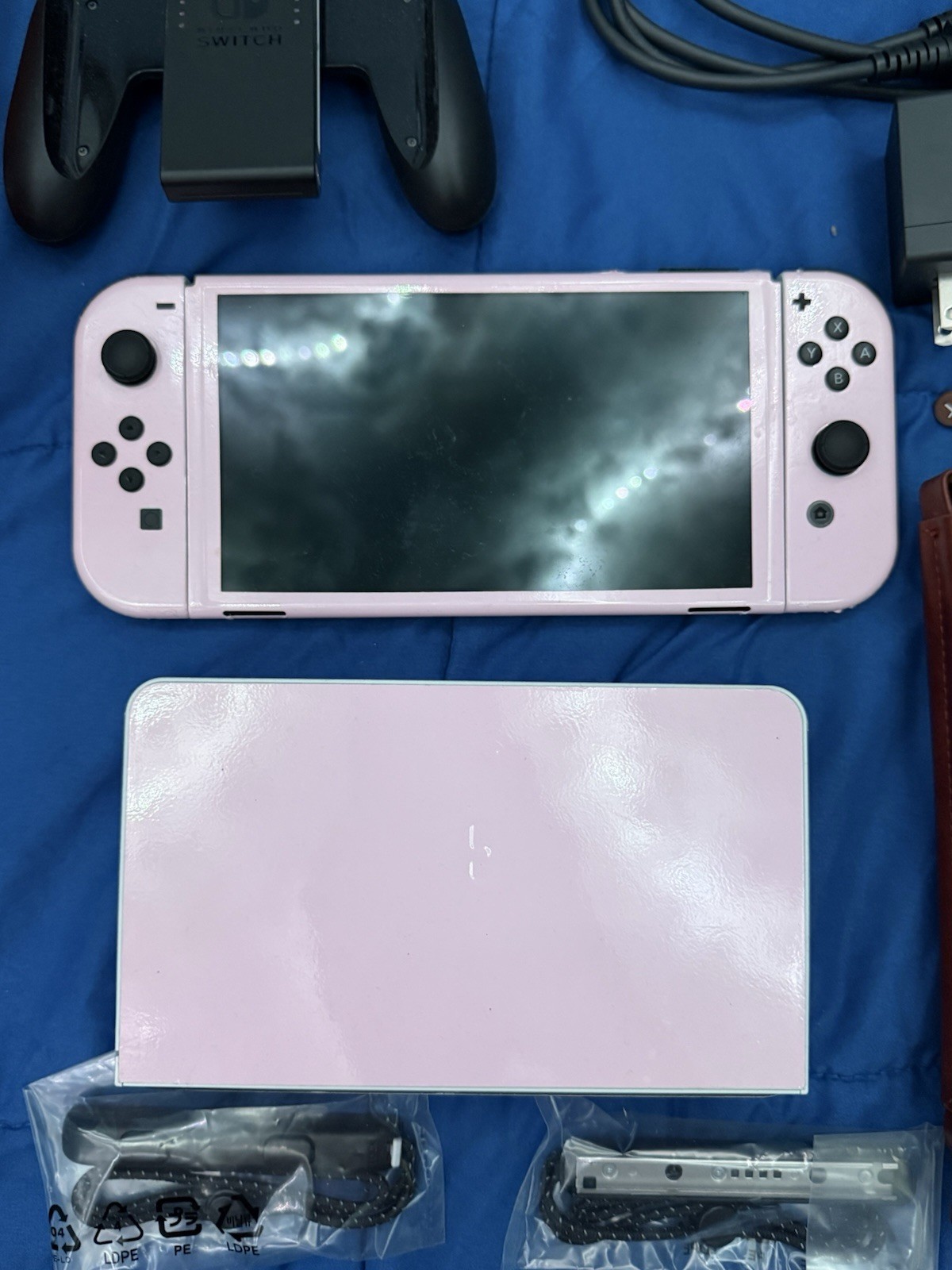 Nintendo Switch OLED Bundle – Pink Vinyl Skin, 3 Physical Games Accessories