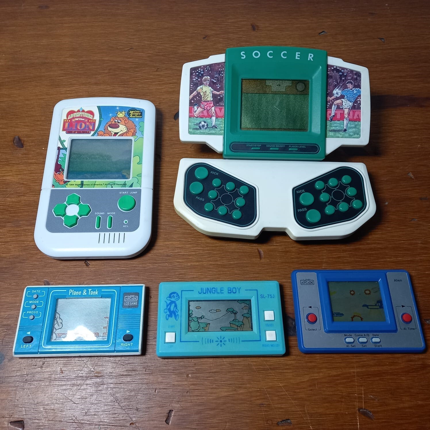 Lot of 5 Handheld Electronic Games Soccer, Alien, Adventures of the lion AS-IS
