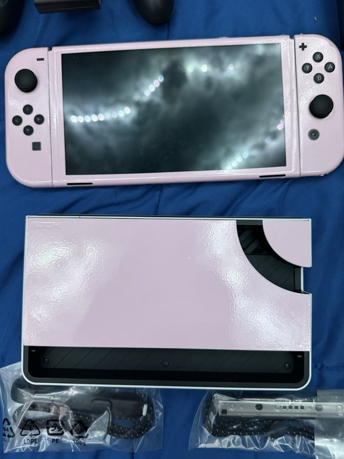 Nintendo Switch OLED Bundle – Pink Vinyl Skin, 3 Physical Games Accessories