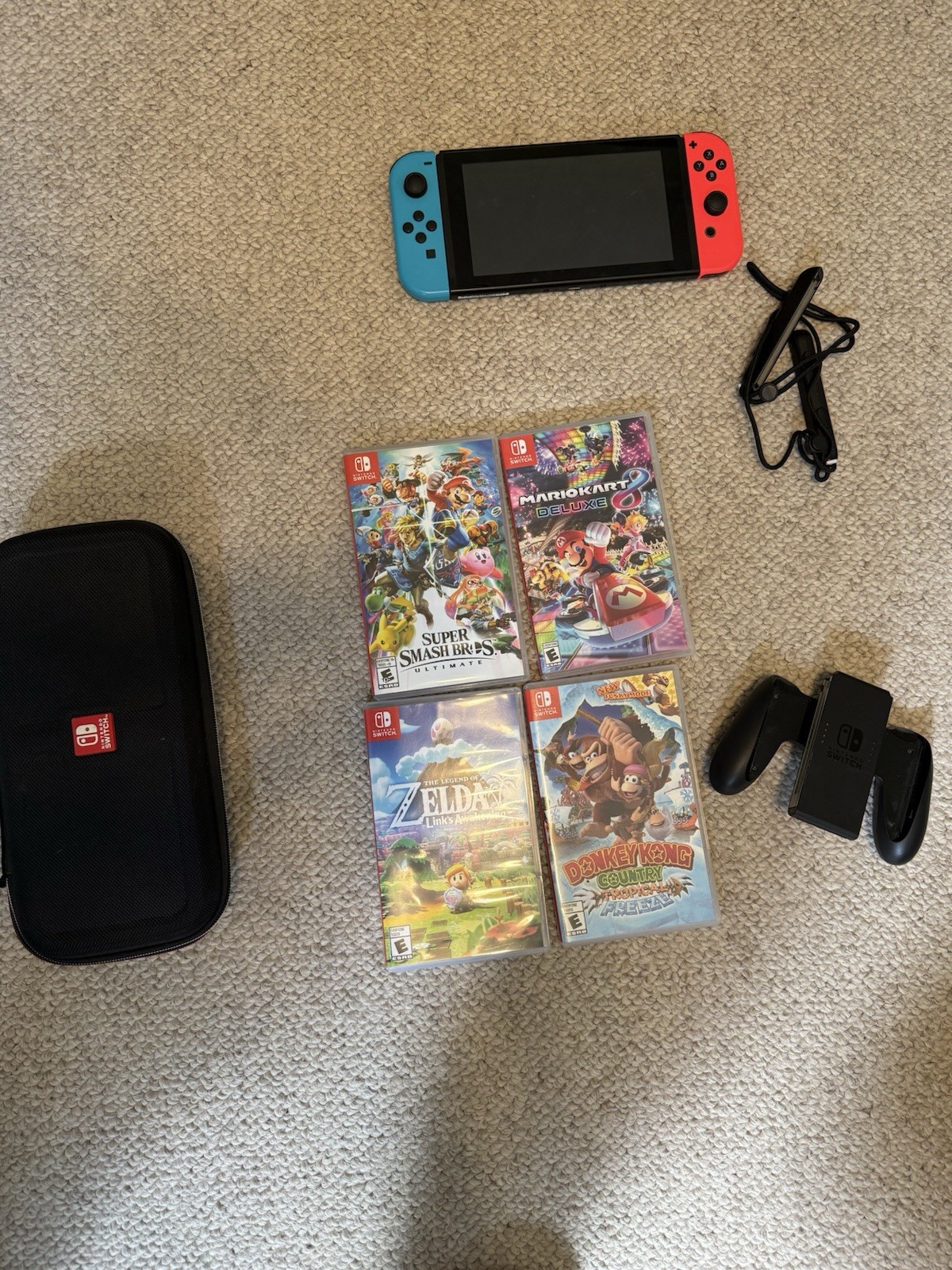 Nintendo Switch with Case and Multiple Games and Accessories Full Charging Dock