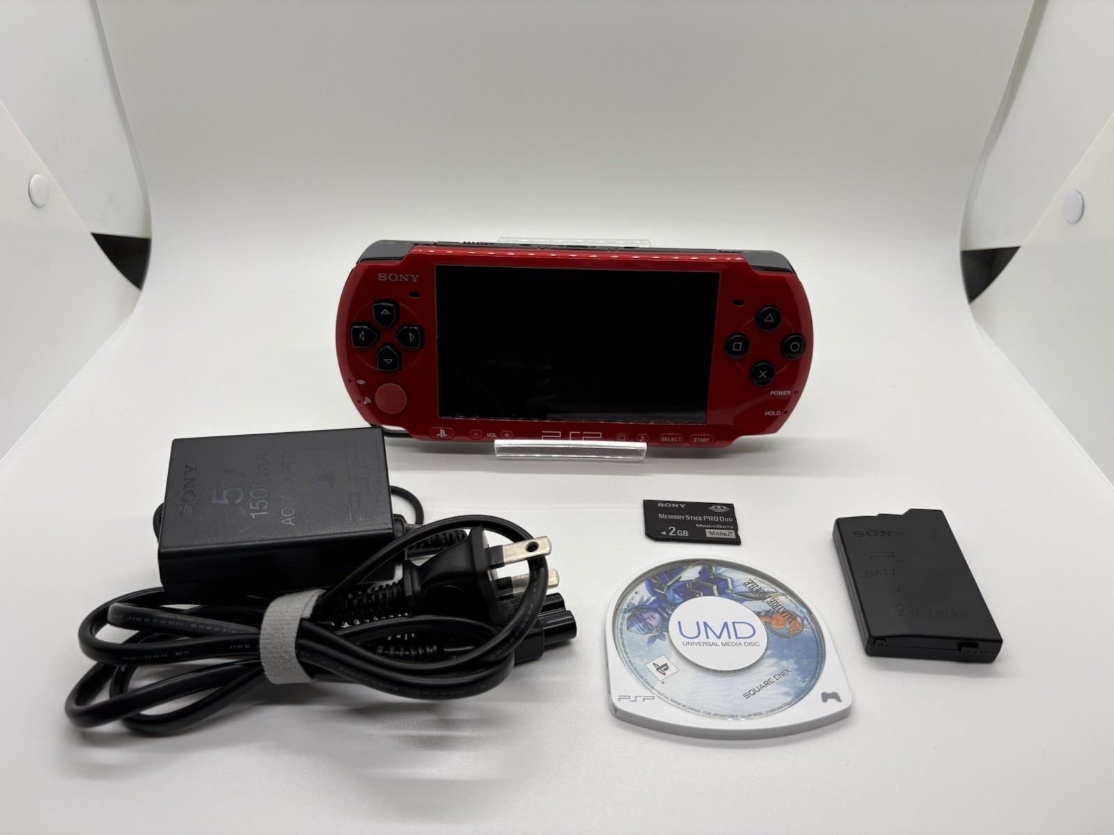 [Very Good] Sony PSP 3000 Tested Red/Black w/ Cable, 2GB, Battery, 1 Bonus UMD