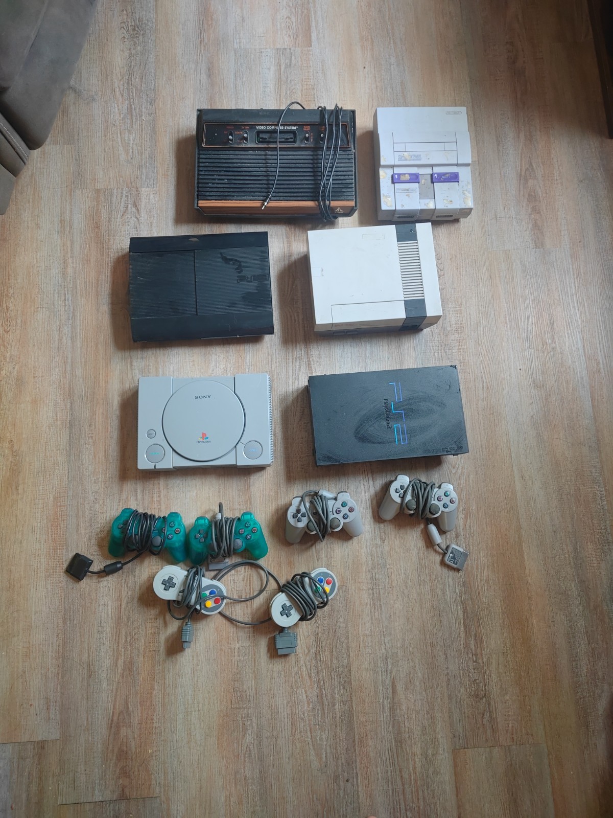 Huge Retro Video Game Console Lot Atari 2600 NES SNES PS1 PS2 PS3 + Controllers